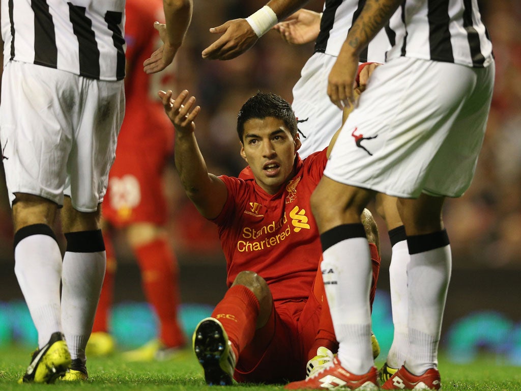 Luis Suarez scored soon after coming on but could not rescue Liverpool last night
