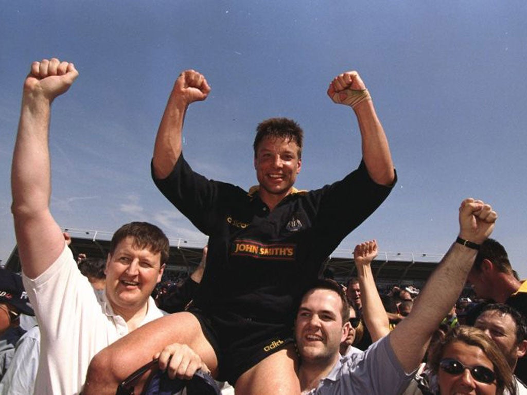 Rob Andrew is carried shoulder high after Newcastle’s Premiership triumph in 1998 while (below) Alan Tait experiences different emotions in less successful times for the Falcons