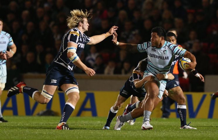 Manusamoa Tuilagi of Leicester tries to escape the Sale cover
