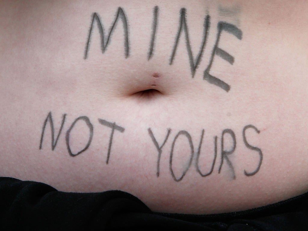 A protester from an Abortion Rights group campaigning in London