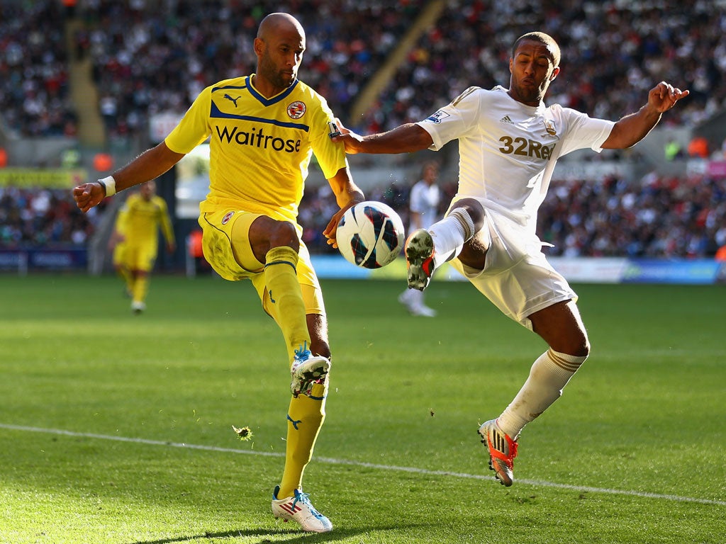 Swansea 2-2 Reading Jimmy Kebe of Reading battles for the ball with Wayne Routledge of Swansea City