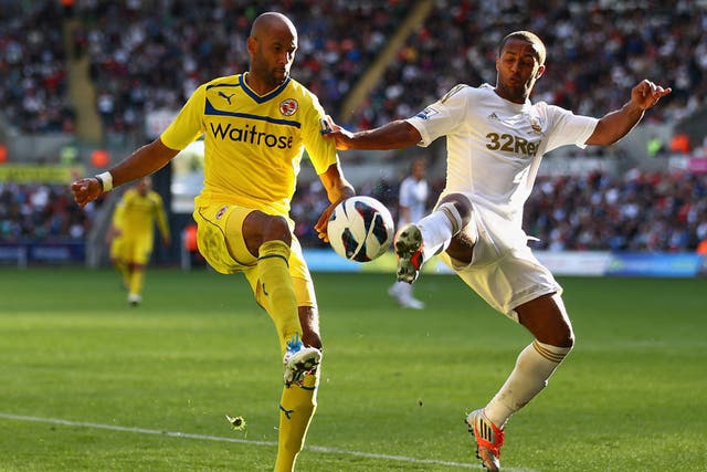 <b>Swansea 2-2 Reading</b>
Jimmy Kebe of Reading battles for the ball with Wayne Routledge of Swansea City