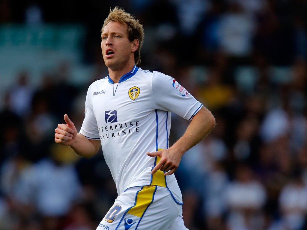 Touch of class: Luciano Becchio gave Leeds the win with a dinked penalty