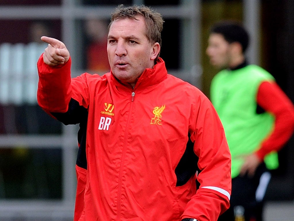 New direction: Brendan Rodgers is teaching his passing game to Liverpool while also waiting for some promising youngsters to come through