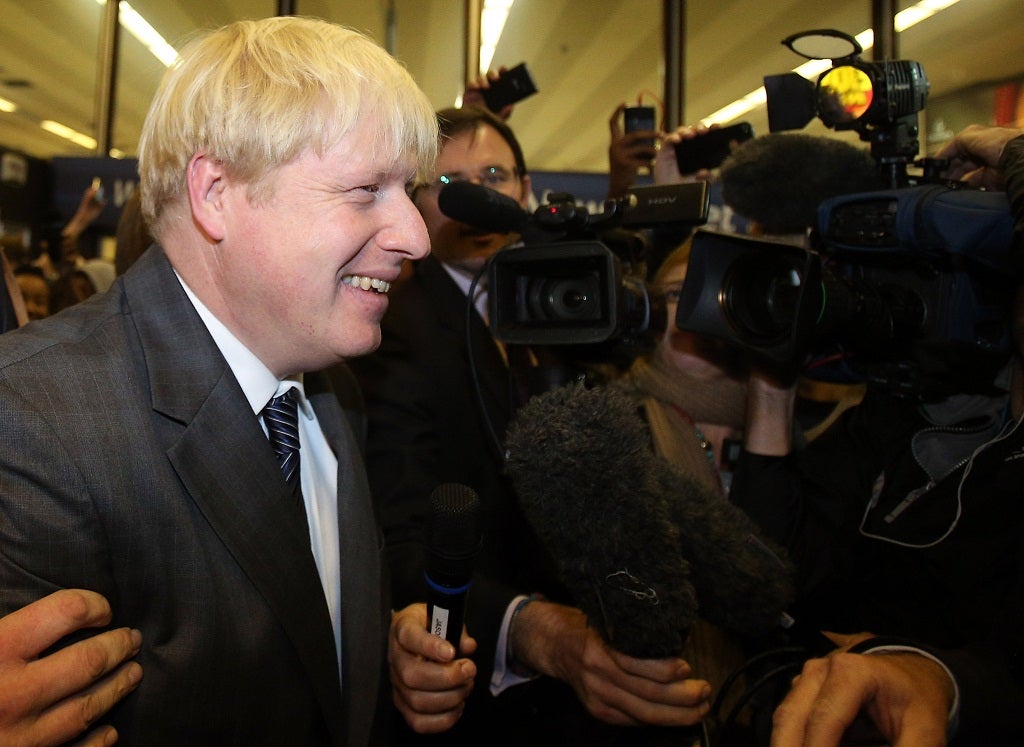 Boris Johnson in a media scrum at the 2012 Conservative party conference
