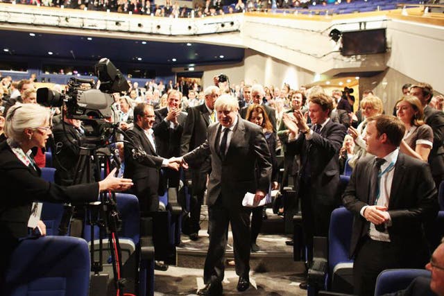 Boris Johnson creates a stir as he arrives to speak at the Tory conference yesterday 
