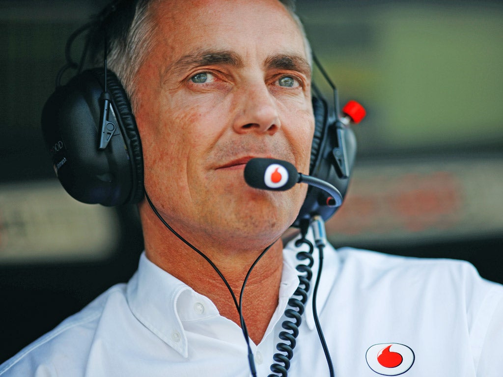 Martin Whitmarsh said that McClaren were in a 'development race' with Red Bull