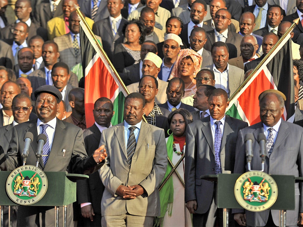 President Mwai Kibaki (far right) vetoed an attempt to award MPs huge pay rises