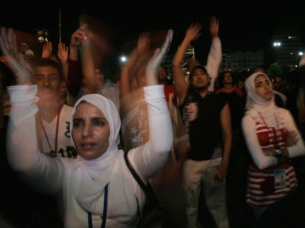 Moroccan youth attends French rapper Joey Starr concert 22 July 2007 during the Casa Music festival in the capital Casablanca.