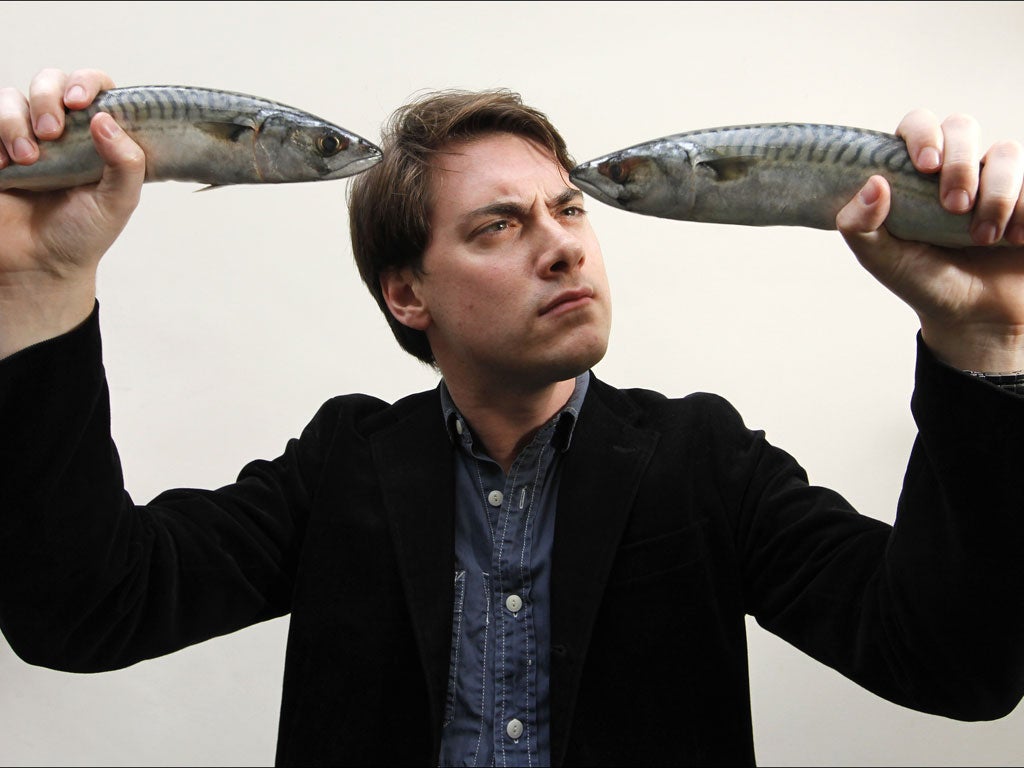 Sink or swim: writer Jamie Merrill with two line-caught Cornish mackerel