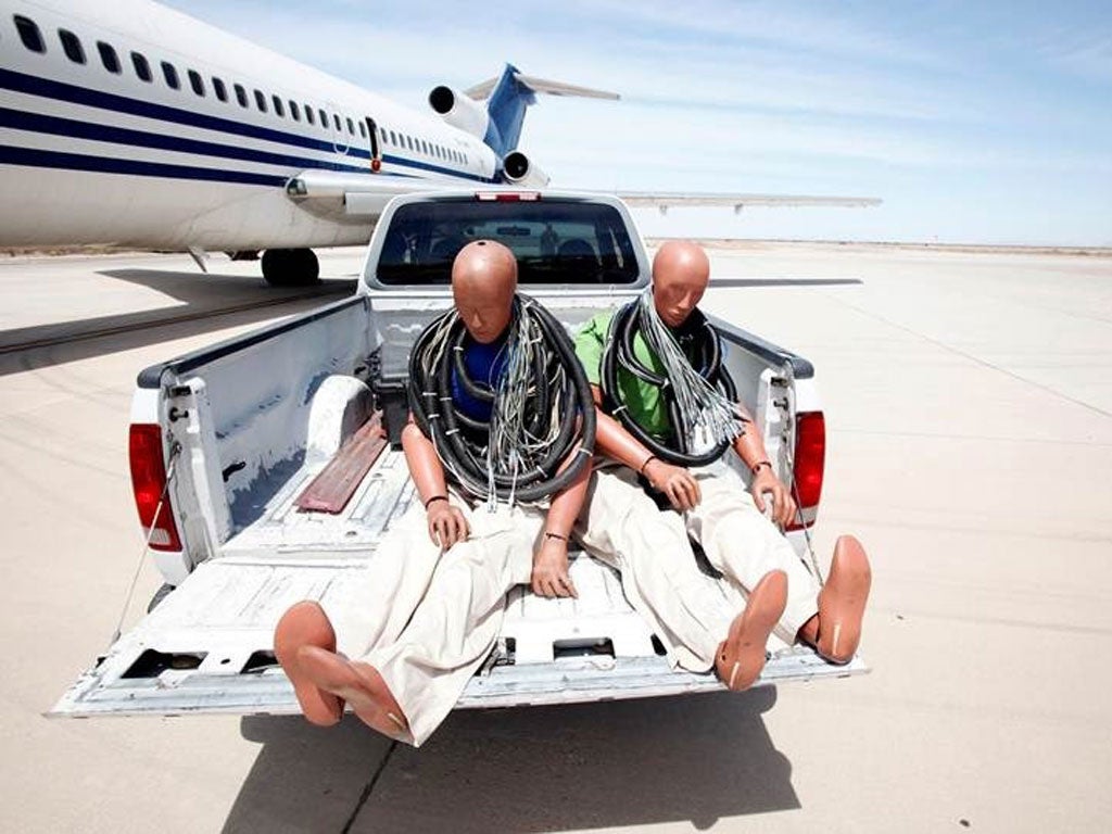 Dummies being loaded onto the plane before the crash