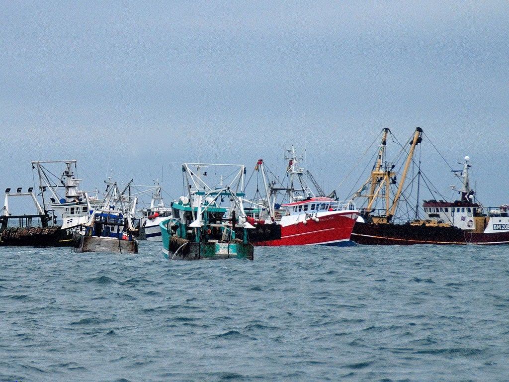 British fish boats center and right, being prevented to fish by French fishermen, in the English Channel, off Le Havre, western France