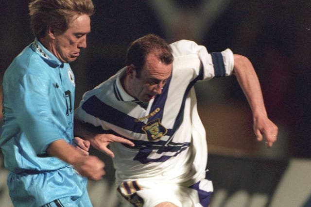 San Marino's Massimo Bonini (left) in action against Scotland