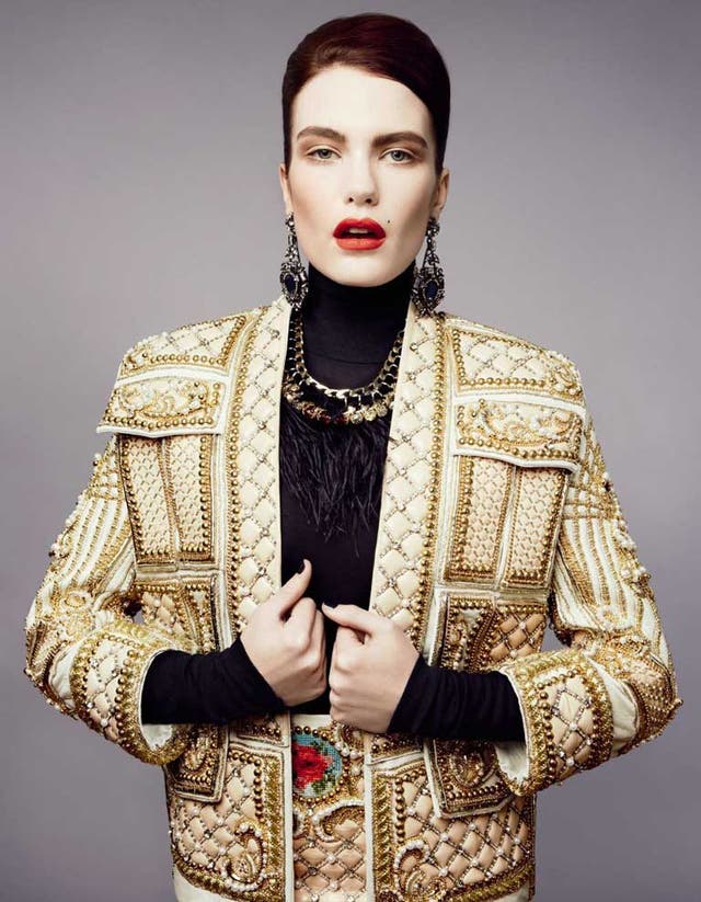 Beaded jacket and skirt, both from a selection, and black top, £400, all balmain.com; earrings, £890, and black feather necklace, £850, both lanvin.com