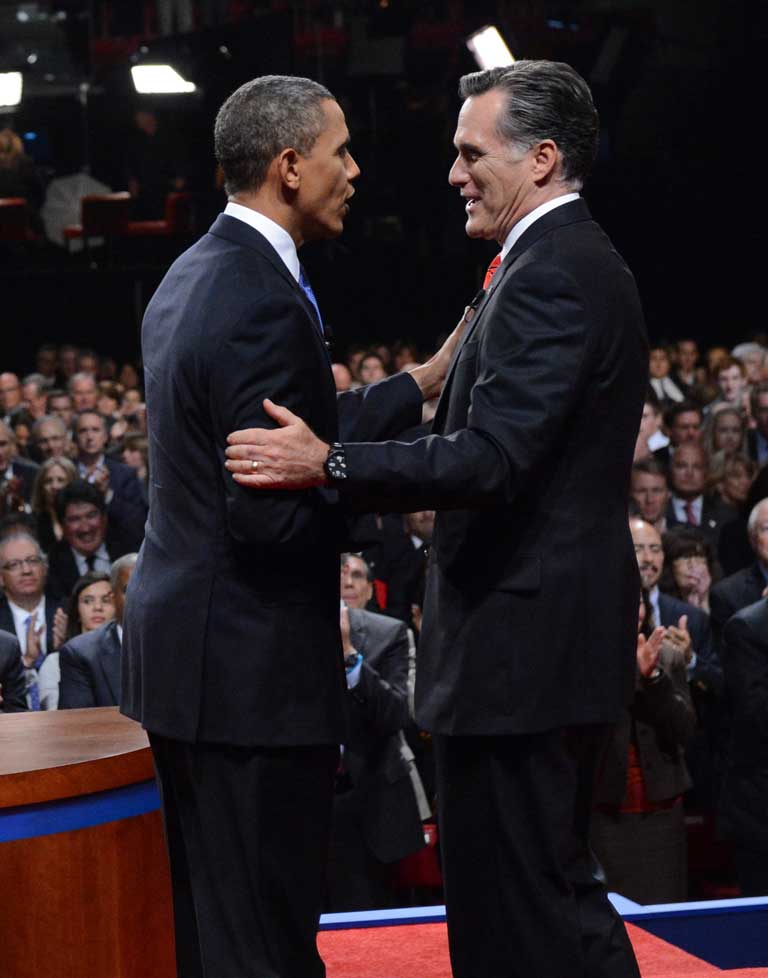 Can we...? We can! Barack Obama and Mitt Romney shake hands at the end of the presidential debate