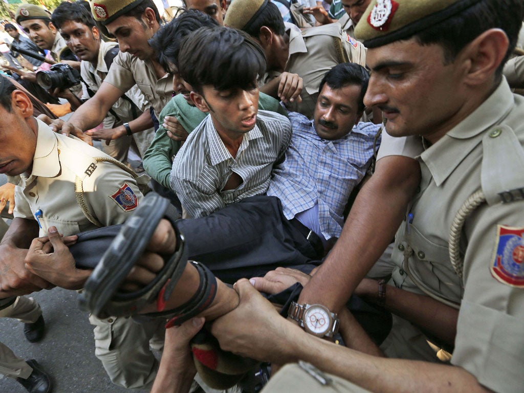 Arvind Kejriwal is hauled off by police on Friday