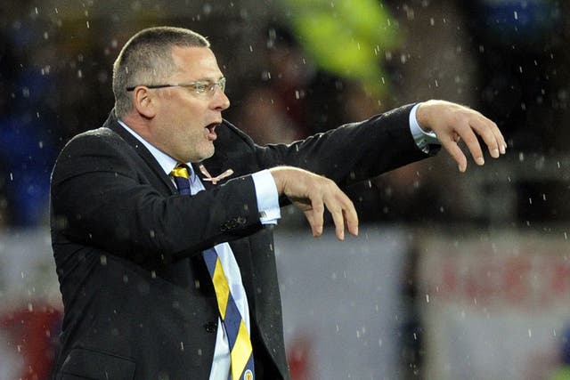 Tartan trouble: Craig Levein during Scotland's 2-1 defeat in Cardiff. After the match he blamed the officials