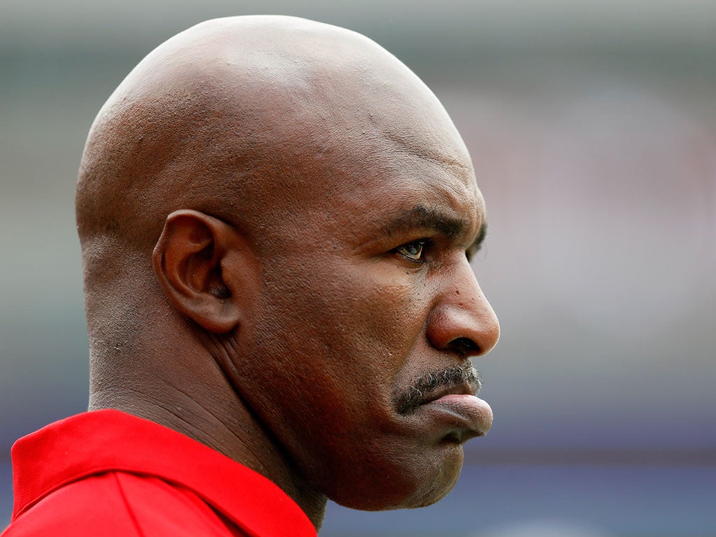 Money for old ropes: Evander Holyfield is selling the robe he wore when Mike Tyson bit his ear off and his beloved 1962 Corvette, as well as his belts and medals