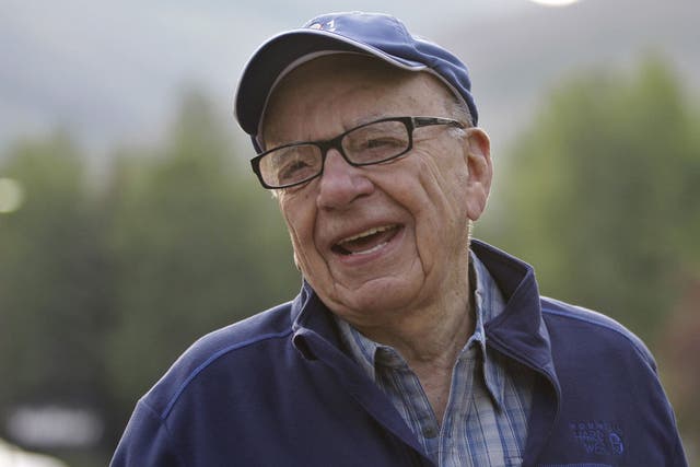 Fighting fit: Rupert Murdoch seems untroubled by shareholders' motion to unseat him