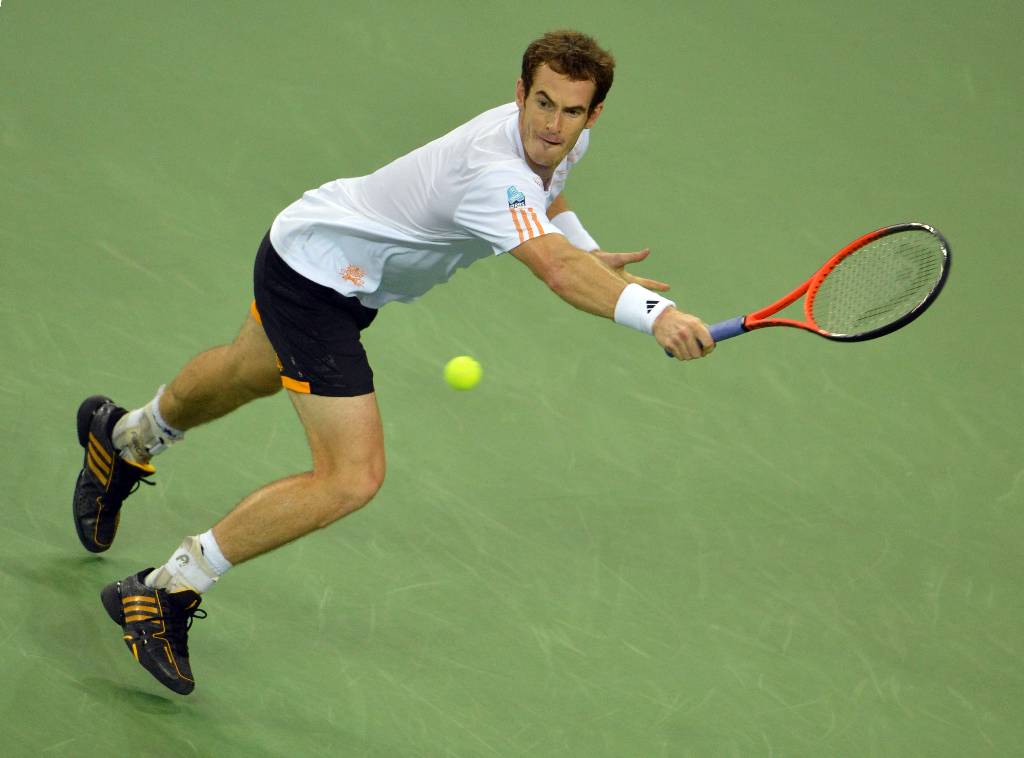 Andy Murray of Britain returns against Novak Djokovic of Serbia during their finals match at the Shanghai Masters