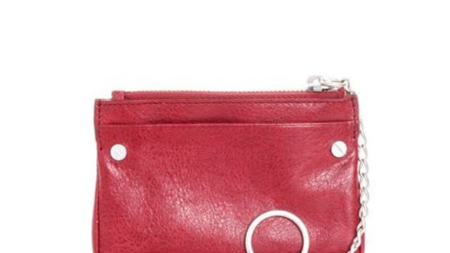 <p>1. Coin wallet</p>

<p>£155, Balenciaga, matchesfashion.com</p>

<p>This lambskin leather coin wallet has a zip fastening and a silver chain key ring attached to it, so you can also keep your keys safe.</p>