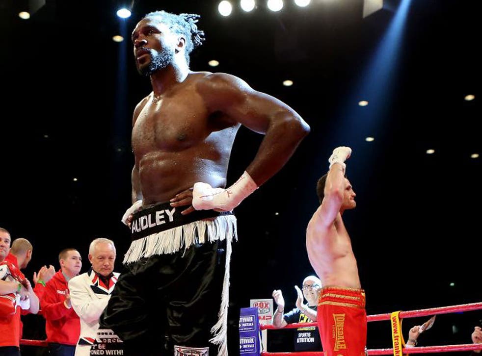 Audley Harrison looks dejected after his defeat to David Price