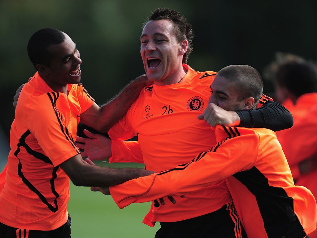 John Terry with Oriol Romeu (right) and Ashley Cole in training last month