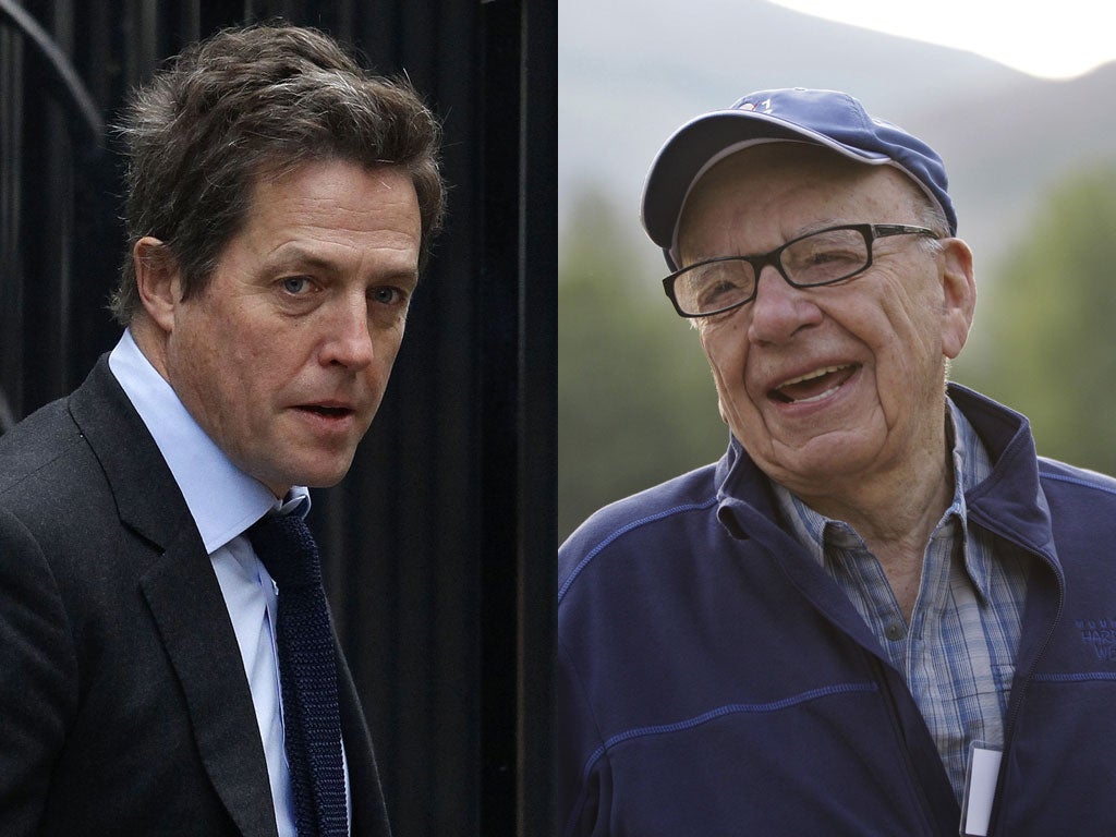 Rupert Murdoch has expressed regret for his personal comments about media campaigner Hugh Grant