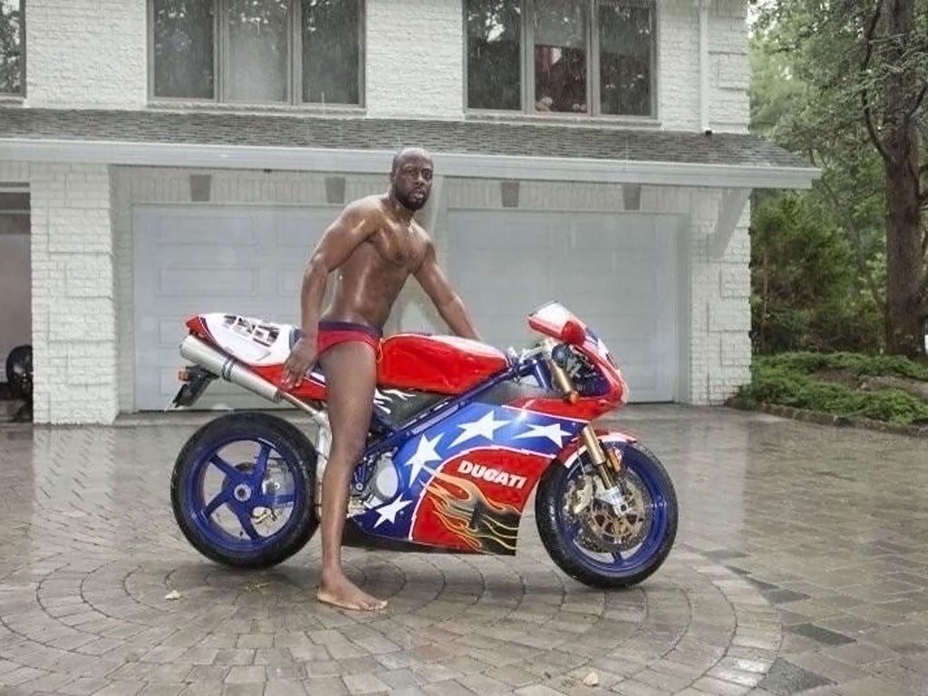 The body: Wyclef, Wyclef, Wyclef, remember what we talked about? You were supposed to put the oil in the bike The house: This looks like it was taken outside Jean's New Jersey home. We hope it has a gated drive to keep the, er, lus