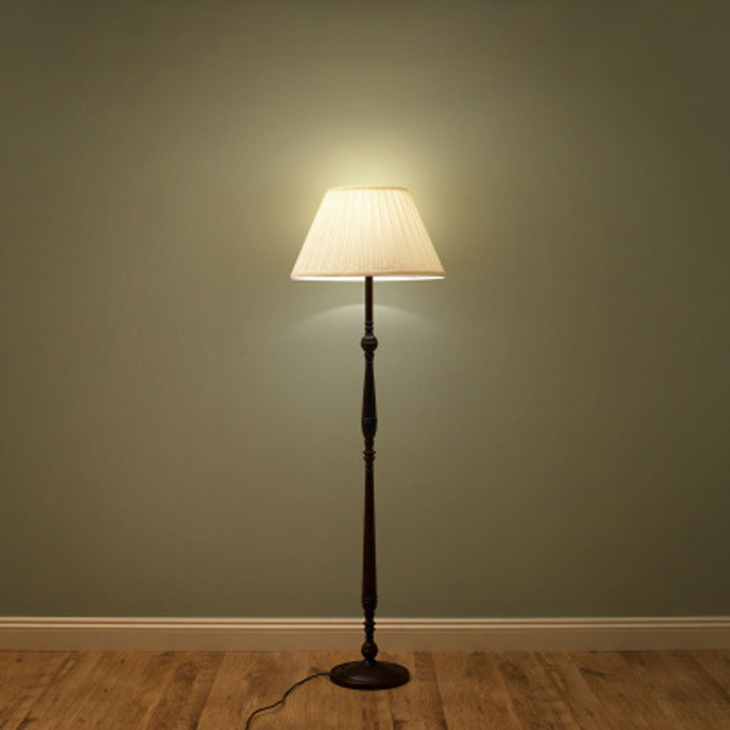 If a room lacks height, opt for wall sconces, table lights and floor lamps