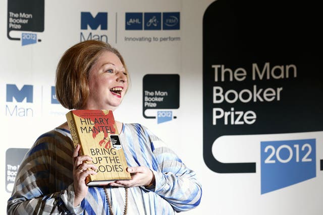 British author Hilary Mantel poses for pictures after winning the 2012 Man Booker literary prize for her novel 'Bring Up The Bodies' in London on October 16, 2012.