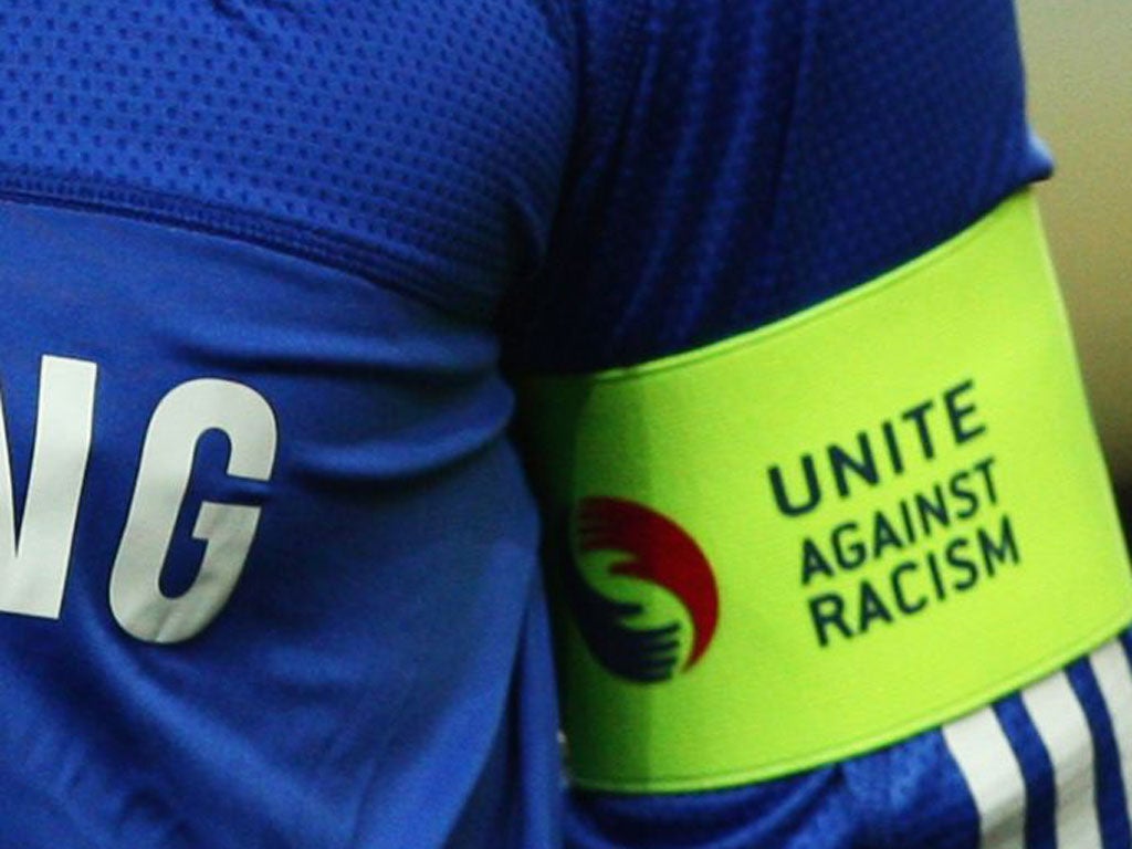 A detailed view of the Chelsea badge and ‘Unite Against Racism’