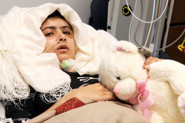 The Pakistani teenager Malala Yousafzai pictured in her Birmingham hospital bed
