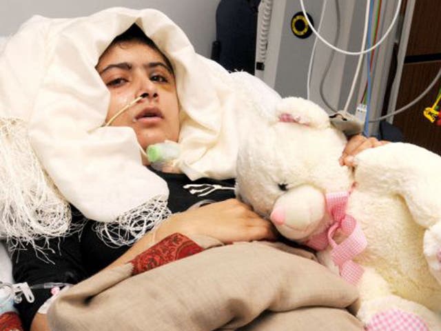 The Pakistani teenager Malala Yousafzai pictured in her Birmingham hospital bed