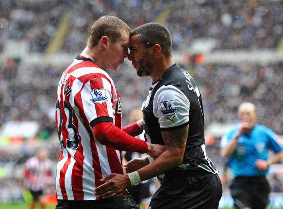 Newcastle United’s Danny Simpson and Sunderland winger James McClean square up during last season’s typically fiery derby