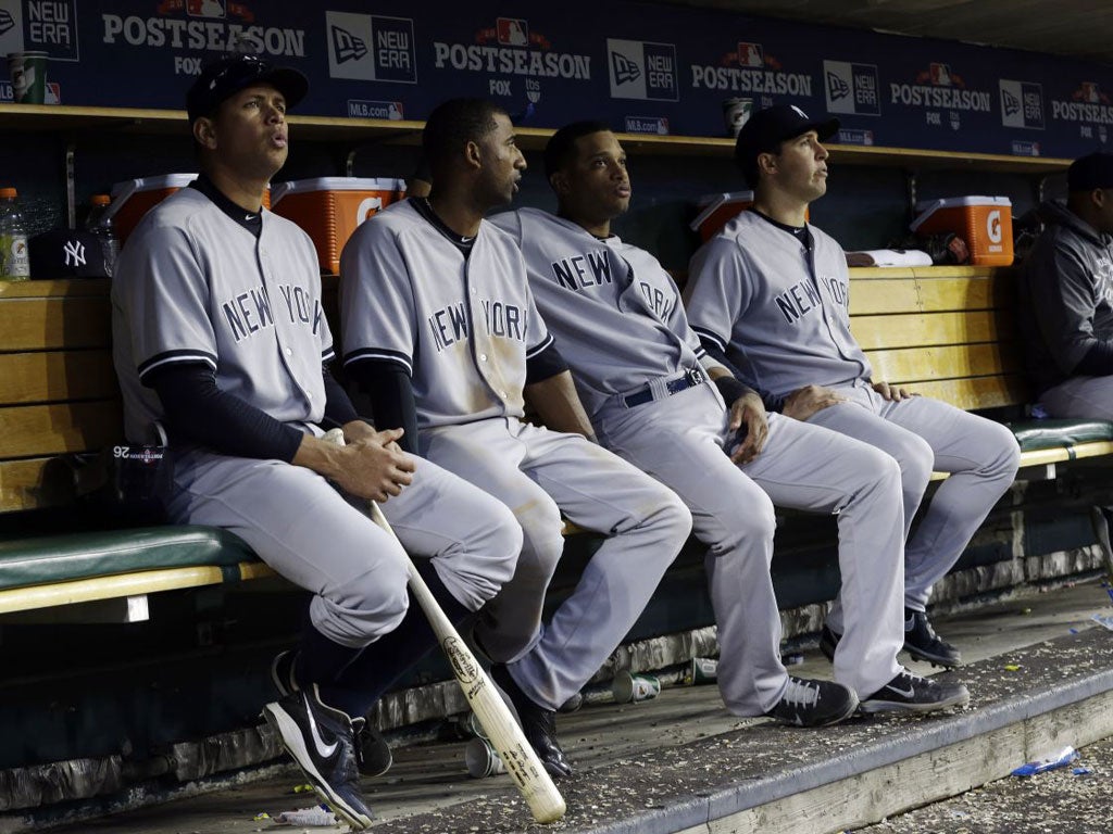 Alex Rodriguez (left) sits it out with humiliated Yankees team-mates in Detroit