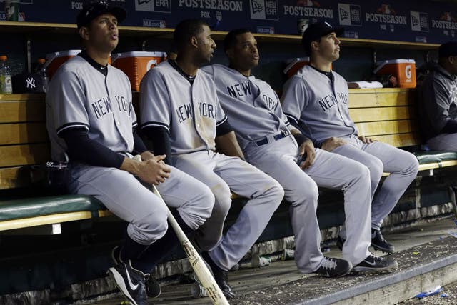 Alex Rodriguez (left) sits it out with humiliated Yankees team-mates in Detroit 