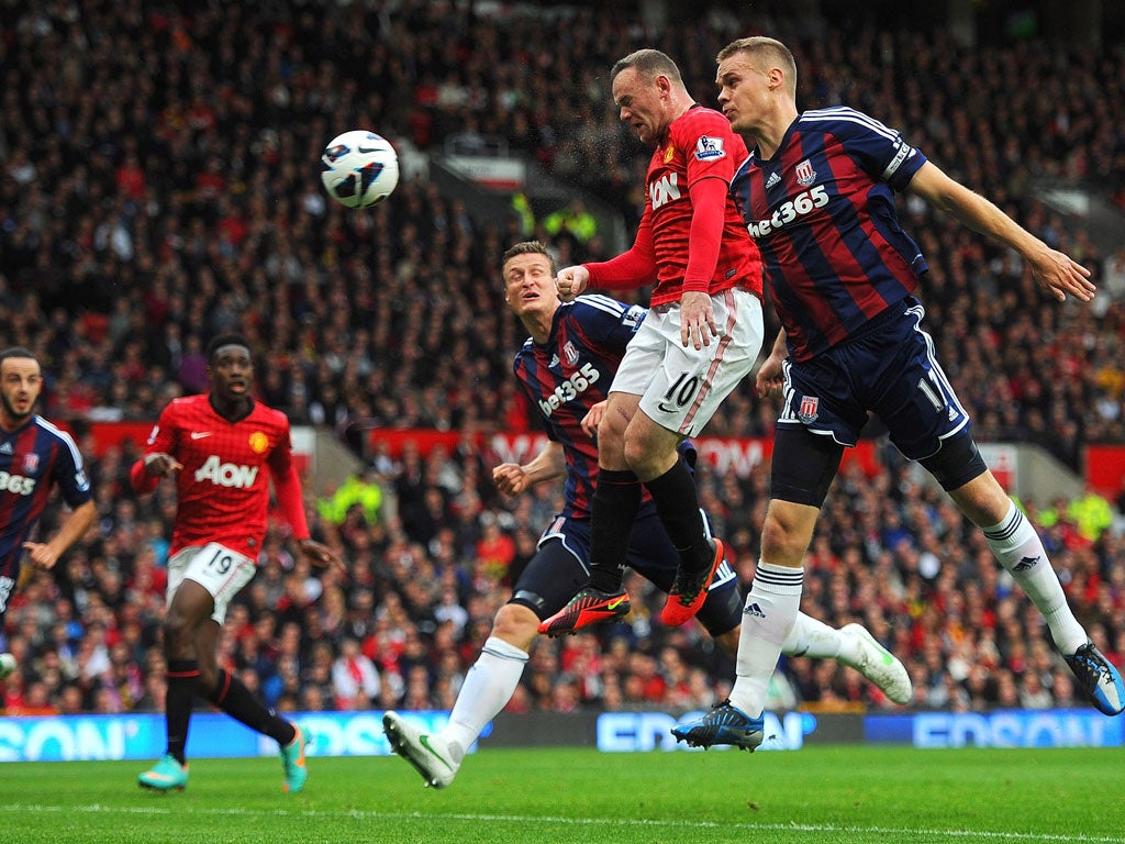 Wayne Rooney heading in United's equaliser against Stoke