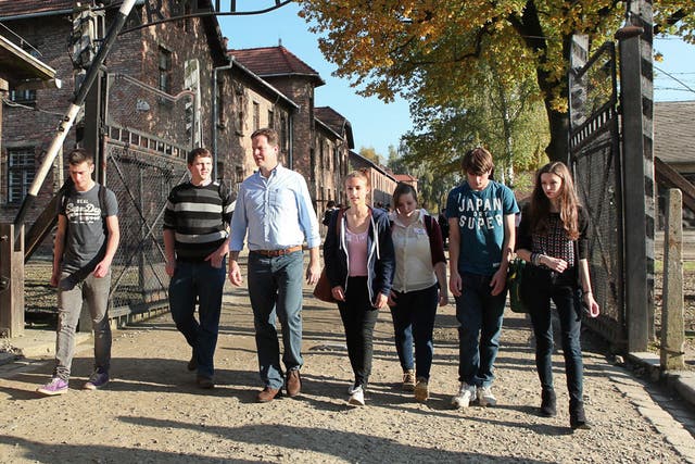 Witnesses: Nick Clegg with some sixth-form students at Auschwitz last week 