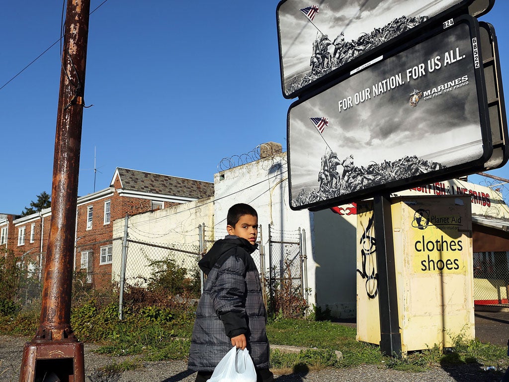 Poverty trap: A child in Camden, New Jersey, the most impoverished US city
