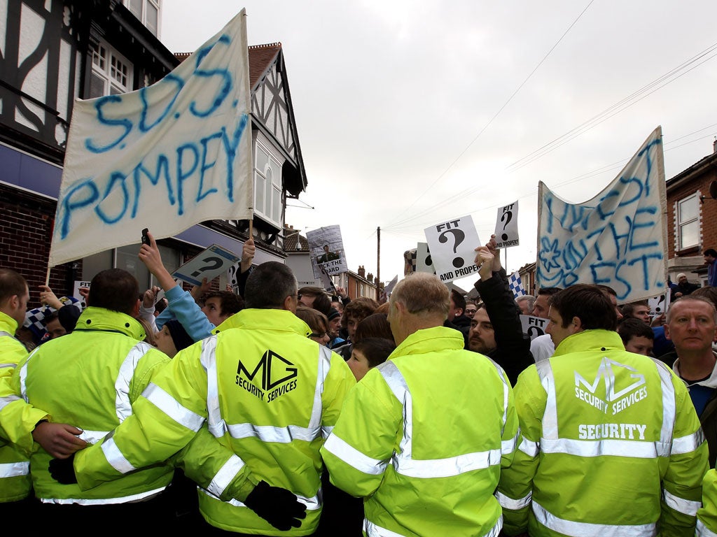 Fighting back: Fans protest outside Fratton Park against the club’s owners. Now the Portsmouth Supporters Trust is the preferred bidder