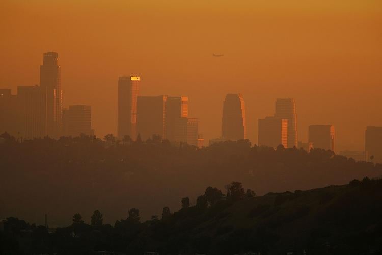 Los Angeles: The downtown skyline is enveloped in smog shortly before sunset