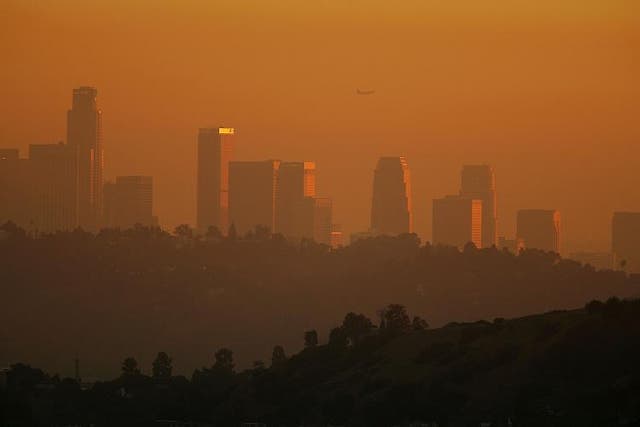 Los Angeles: The downtown skyline is enveloped in smog shortly before sunset