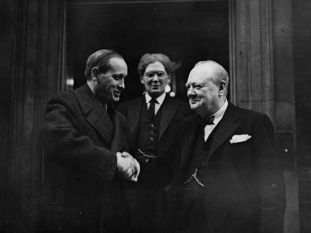 President Franklin Delano Roosevelt's special envoy Harry Lloyd Hopkins (1890 - 1946) (left) shaking hands with British Prime Minister Winston Churchill (1874 - 1965) outside 10 Downing Street, London.