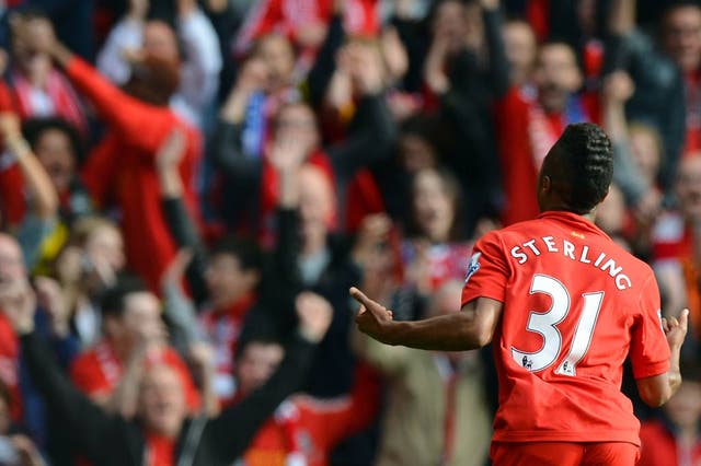 Raheem Sterling celebrates his first senior goal for Liverpool