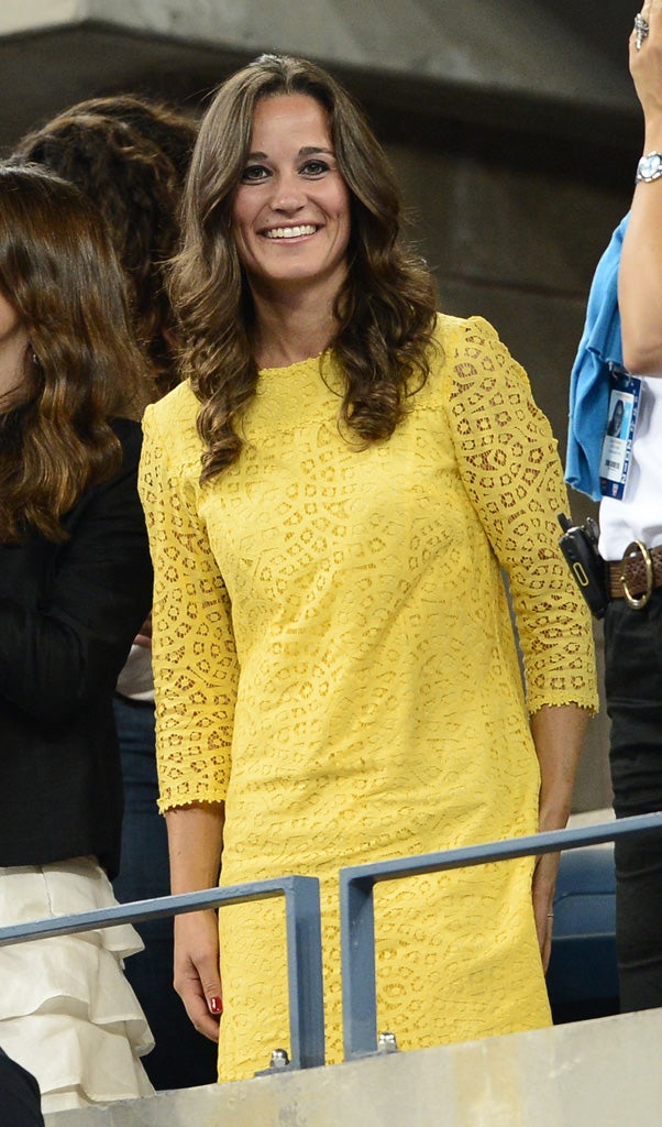 Pippa Middleton watches Czech Tomas Berdych play against Switzerland's Roger Federer during their 2012 US Open men's singles quarterfinal match at the USTA Billie Jean King National Tennis Center in New York on September 5, 2012.