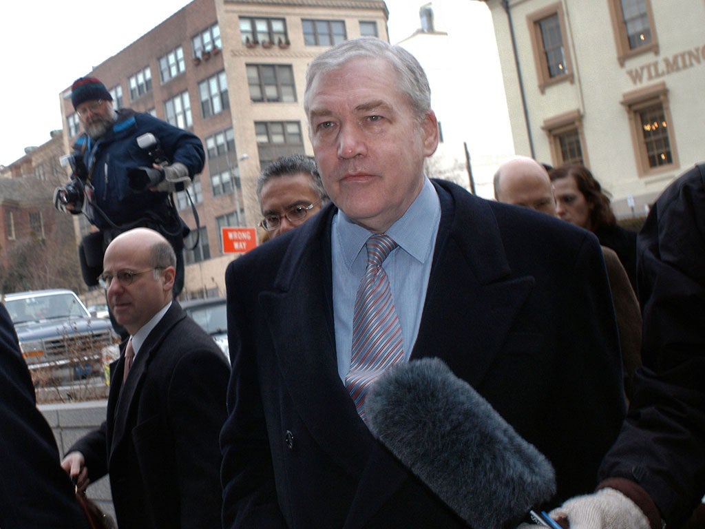 Lord Conrad Black (R) arrives at the New Castle County Courthouse to testify in the lawsuit brought against him by Hollinger International February 20, 2004 in Wilmington, Delaware.