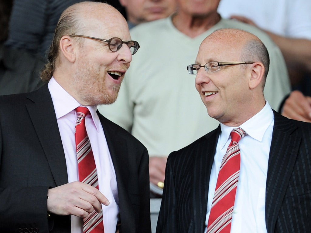 Manchester United Executives Avram and Joel Glazer