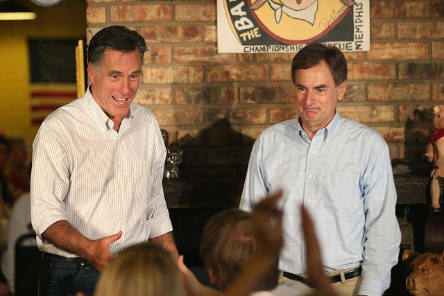 Mitt Romney and Richard Mourdock greet supporters at a campaign event in Indiana in August 