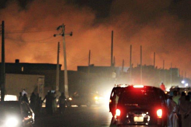 A fire breaks out following Tuesday night's air strike, which killed two people